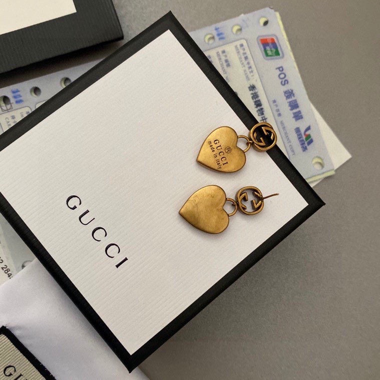 G u c c I earrings